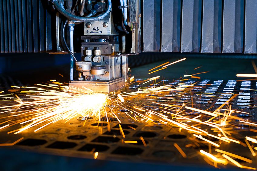 13282247 - laser cutting with sparks close up 13282247 - laser cutting with sparks close up